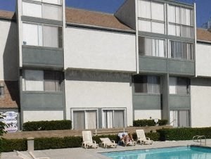 Windward Village Apartments pool area Windward Village Apartments pool area